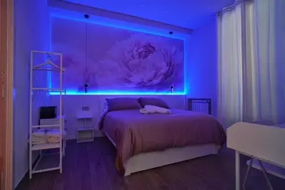 Letto o letti in una camera di Peonia Rooms