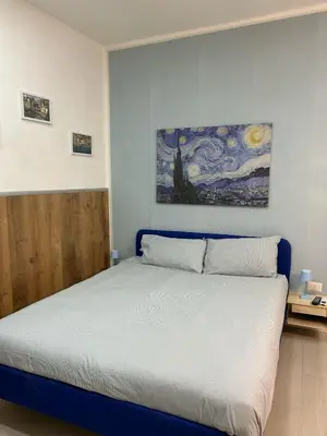 Letto o letti in una camera di Zia Pina