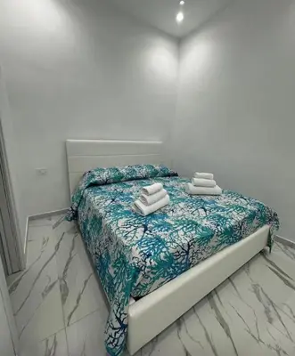 Letto o letti in una camera di Casa Naples