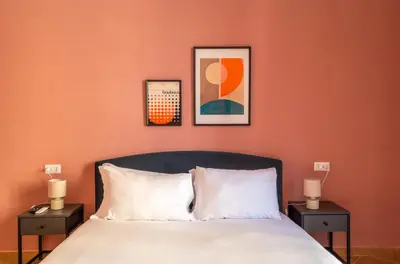 Letto o letti in una camera di Santanotte Apartment