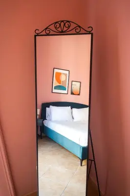 Letto o letti in una camera di Santanotte Apartment