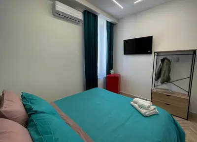 Letto o letti in una camera di B&BPignasecca Anema e Core