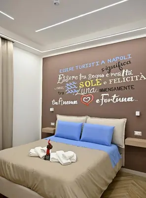 Letto o letti in una camera di B&BPignasecca Anema e Core