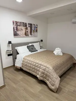 Letto o letti in una camera di Residenza Trinità
