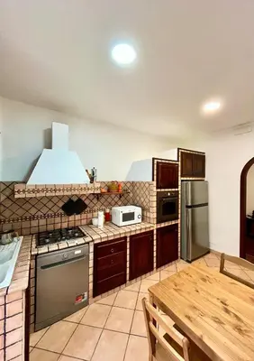 Cucina o angolo cottura di La Casa di Anna - Naples Central Flat - My Place
