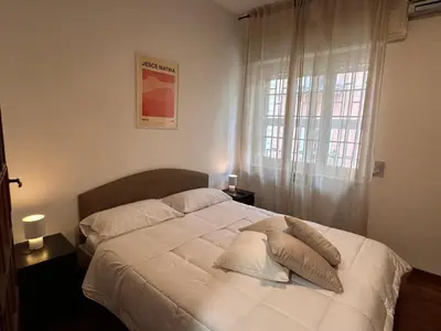 Letto o letti in una camera di La Casa di Anna - Naples Central Flat - My Place