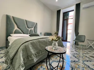 Letto o letti in una camera di Dimora Cor e Mamma