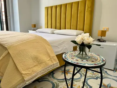 Letto o letti in una camera di Dimora Cor e Mamma