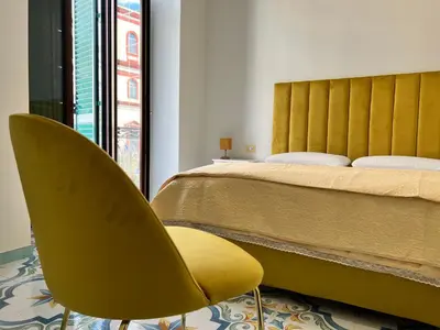 Letto o letti in una camera di Dimora Cor e Mamma