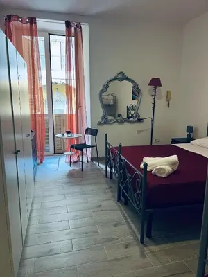 Letto o letti in una camera di Home Cuore di Napoli 5