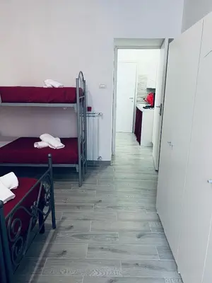 Letto o letti in una camera di Home Cuore di Napoli 5