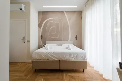 Letto o letti in una camera di Una finestra sul Madre By Dimorra