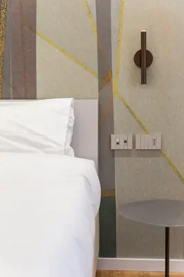 Letto o letti in una camera di Una finestra sul Madre By Dimorra