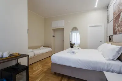 Letto o letti in una camera di Una finestra sul Madre By Dimorra