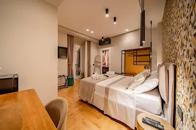 Letto o letti in una camera di Hugo's Home