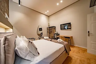 Letto o letti in una camera di Hugo's Home