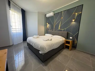 Letto o letti in una camera di Be Italian Flat Vespucci