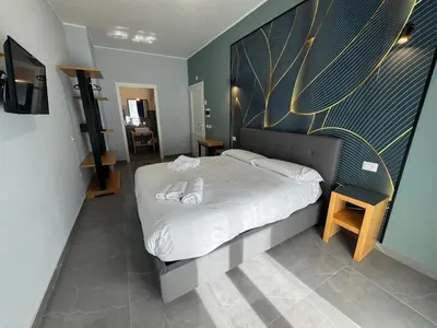 Letto o letti in una camera di Be Italian Flat Vespucci