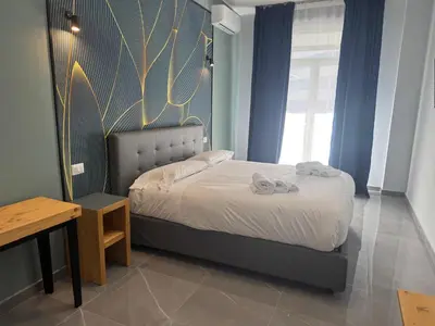 Letto o letti in una camera di Be Italian Flat Vespucci