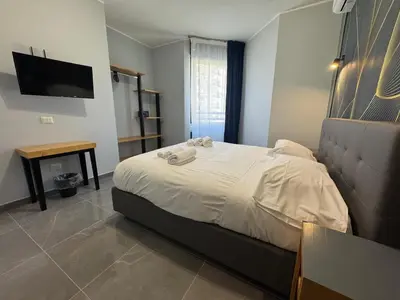 Letto o letti in una camera di Be Italian Flat Vespucci