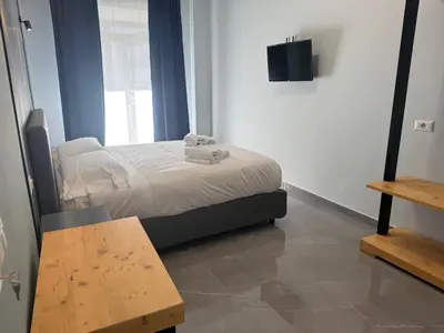 Letto o letti in una camera di Be Italian Flat Vespucci