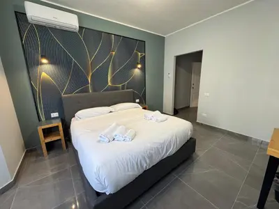 Letto o letti in una camera di Be Italian Flat Vespucci
