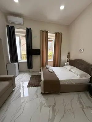 Letto o letti in una camera di Valentino suites&terrace