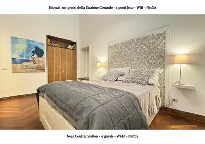 Letto o letti in una camera di STAZIONE CENTRALE - 4 posti letto con wifi e netflix a Piazza Garibaldi