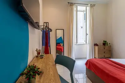 Letto o letti in una camera di Casa al Duomo