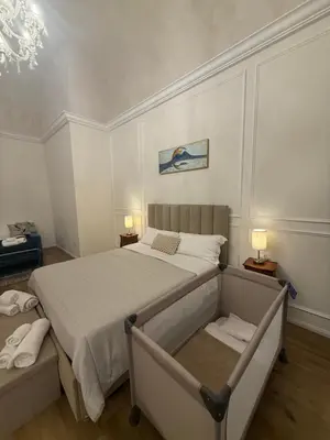 Letto o letti in una camera di Angiolina Suite