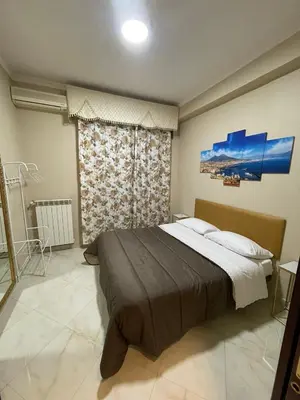 Letto o letti in una camera di Incanto nel centro storico di Napoli