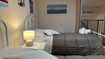 Letto o letti in una camera di IL Balcone su Napoli Antica