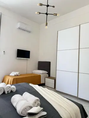 Letto o letti in una camera di Holiday House Station