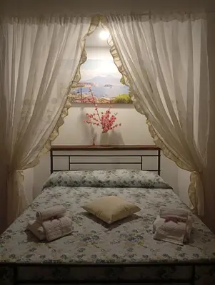 Letto o letti in una camera di Decumani 21