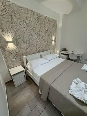 Letto o letti in una camera di ViRen Rooms