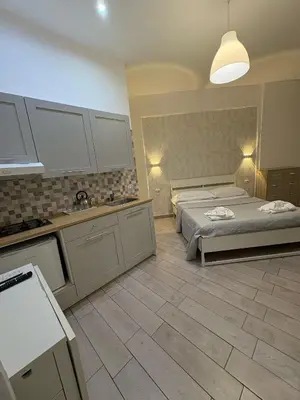 Letto o letti in una camera di ViRen Rooms