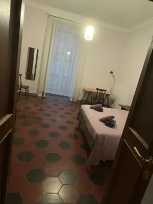 Letto o letti in una camera di Casa Daroca Manzo