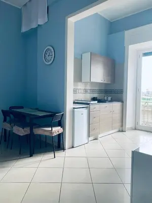 Cucina o angolo cottura di Noviello Apartments VIA DEI MILLE 4 posti