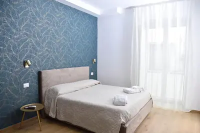 Letto o letti in una camera di Rivieras House - Central Suites Naples