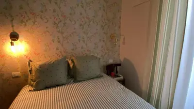 Letto o letti in una camera di Casa Margherita