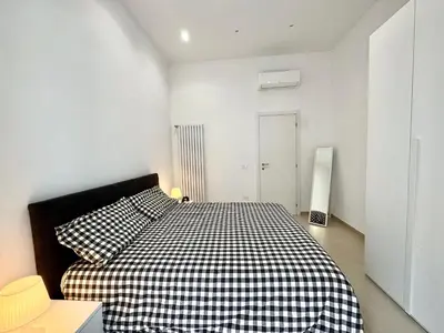 Letto o letti in una camera di La Casa di Luisella