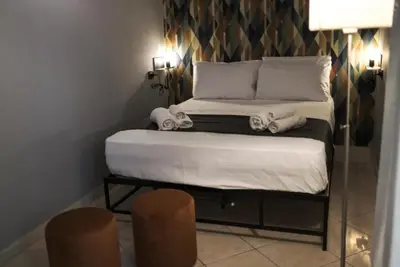 Letto o letti in una camera di Toledo triple room