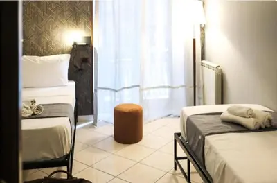 Letto o letti in una camera di Toledo triple room