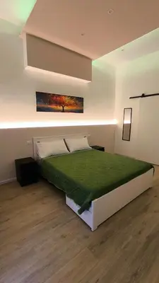 Letto o letti in una camera di Casa San Donato Centro Storico Duomo