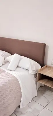 Letto o letti in una camera di Relais Borbonico Chiaia