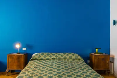 Letto o letti in una camera di Magma Loft by NapoliApartments
