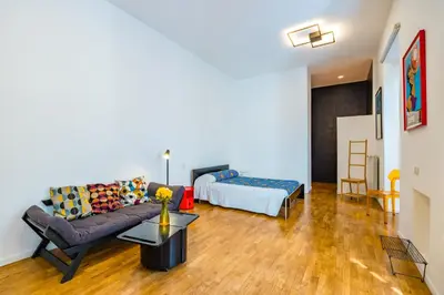 Letto o letti in una camera di Magma Loft by NapoliApartments