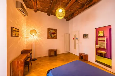Letto o letti in una camera di Magma Loft by NapoliApartments