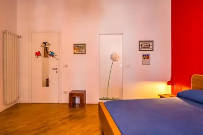 Letto o letti in una camera di Magma Loft by NapoliApartments
