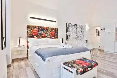 Letto o letti in una camera di GuestHost - Art Space Caravaggio